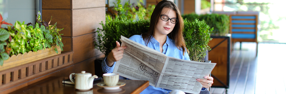 Glasses on a newspaper